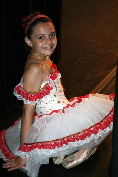 Young girl posing in ballerina outfit